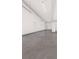 Vast garage space with concrete floors, white walls, and potential for various uses at 25197 Delgado Dr, Punta Gorda, FL 33955