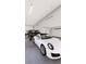 Spacious garage with a black Hummer, a white Porsche, and ample room for parking at 25197 Delgado Dr, Punta Gorda, FL 33955