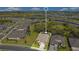 Bird's-eye view of home in a well-maintained neighborhood with lakes and community amenities at 10735 Spring Tide Way, Parrish, FL 34219