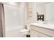 Bright bathroom featuring a bathtub, toilet, and vanity with ample counter space at 10735 Spring Tide Way, Parrish, FL 34219
