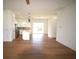 Open-concept living area with kitchen island and stainless steel appliances at 3092 Crowder St, Port Charlotte, FL 33980