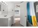 Clean and bright bathroom with modern fixtures, tile accents, and a spacious layout at 514 Fitzhugh Ave, Punta Gorda, FL 33950