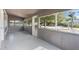 Cozy sun room bathed in natural light, offering serene views and a relaxing atmosphere at 514 Fitzhugh Ave, Punta Gorda, FL 33950