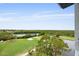 Scenic aerial view overlooking a golf course, water, and the Intracoastal waterway at 14810 Rue De Bayonne # 7B, Clearwater, FL 33762