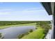 Stunning views of a serene lake and a meticulously maintained golf course from the property at 14810 Rue De Bayonne # 7B, Clearwater, FL 33762