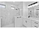Bathroom with marble-like tile and double shower at 2805 Anniston Rd, North Port, FL 34288