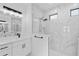 Bright bathroom with double shower, double vanity, and black fixtures at 2805 Anniston Rd, North Port, FL 34288