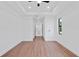 Bright and airy bedroom space showcasing modern finishes, a tray ceiling, recessed lights, and a large window at 2805 Anniston Rd, North Port, FL 34288