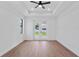 Spacious bedroom featuring a ceiling fan, recessed lighting, and large windows at 2805 Anniston Rd, North Port, FL 34288