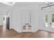Hallway with an interior glass door leading to the kitchen and the other to an exterior door at 2805 Anniston Rd, North Port, FL 34288