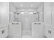 Marble tiled double shower with dual shower heads at 2805 Anniston Rd, North Port, FL 34288