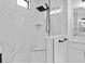 Close up of marble tiled shower with dual shower heads at 2805 Anniston Rd, North Port, FL 34288