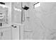Marble tiled shower with black fixtures at 2805 Anniston Rd, North Port, FL 34288