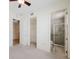 Bedroom with ensuite bathroom and walk-in closet at 235 Cocoanut Ave # 129E, Sarasota, FL 34236