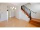 Foyer with hardwood floors features a view of the stairs at 235 Cocoanut Ave # 129E, Sarasota, FL 34236