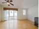 Spacious and bright open living space with hardwood floors and large windows at 235 Cocoanut Ave # 129E, Sarasota, FL 34236