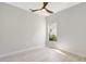 Cozy bedroom with a ceiling fan and lots of natural light at 11019 Pine Lilly Pl, Lakewood Ranch, FL 34202