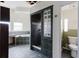 Spacious bathroom with a tub, tiled shower, and toilet at 11120 5Th E St, Treasure Island, FL 33706