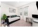 Bright bedroom with a comfortable daybed, stylish decor, and a functional workspace for study or work at 13532 Palmera Vista Dr, Riverview, FL 33579