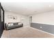Bright loft area featuring a comfortable seating area, perfect for relaxation and leisure at 13532 Palmera Vista Dr, Riverview, FL 33579