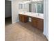 Bathroom includes dual sinks, cabinetry, and views of the shower and toilet at 4249 Hawksley Pl, Wesley Chapel, FL 33545