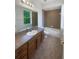 Full bathroom with tile floors, a tub/shower combination, and a single sink vanity at 4249 Hawksley Pl, Wesley Chapel, FL 33545