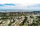 This home features a great aerial view of a quaint, waterside neighborhood at 201 Chardin Dr, Nokomis, FL 34275