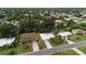 Beautiful aerial view of the neighborhood with tree-lined streets and well-maintained homes at 201 Chardin Dr, Nokomis, FL 34275