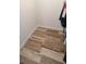 Walk-in closet with a hanging rack for clothes, offering ample storage space with a clean, organized layout at 201 Chardin Dr, Nokomis, FL 34275