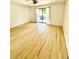 Bright room with modern floors and patio access at 22620 Gage Loop # 25, Land O Lakes, FL 34639