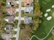 Birds-eye view of the property showing a neighborhood layout near a golf course at 2444 Grandfather Mtn, Spring Hill, FL 34606