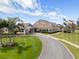An inviting clubhouse with a grand entrance and meticulously maintained grounds at 2444 Grandfather Mtn, Spring Hill, FL 34606