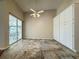 Bright dining area with tile floors, ample storage, and sliding glass door to the sunroom at 2444 Grandfather Mtn, Spring Hill, FL 34606