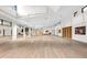 Bright, spacious fitness studio with wood-look floors and shelving at 2444 Grandfather Mtn, Spring Hill, FL 34606