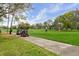 Golf course with players and carts at 2444 Grandfather Mtn, Spring Hill, FL 34606
