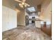Spacious eat-in kitchen with stone tile flooring, granite counters, and stainless steel appliances at 2444 Grandfather Mtn, Spring Hill, FL 34606