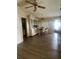 Open dining area featuring laminate floors, a dining table, and built in cabinetry at 34315 Timberland Blvd, Wesley Chapel, FL 33543