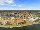 Aerial view of the waterfront community features canals, and homes with docks at 3629 Licata Ct, Punta Gorda, FL 33950
