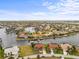 Expansive aerial view showcasing waterfront homes with boat docks in a tranquil neighborhood at 3629 Licata Ct, Punta Gorda, FL 33950