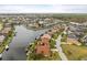 Aerial view of homes located on canals with access to water and private boat docks at 3629 Licata Ct, Punta Gorda, FL 33950
