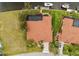 Aerial view of a home featuring a private pool, landscaping, and boat dock access at 3629 Licata Ct, Punta Gorda, FL 33950
