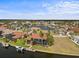 Aerial view showcasing waterfront homes on canal with boat docks and mature landscaping at 3629 Licata Ct, Punta Gorda, FL 33950