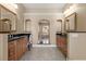 Main bathroom with dual vanities, granite counters and custom mirrors at 3629 Licata Ct, Punta Gorda, FL 33950