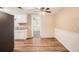 Cozy eat-in kitchen featuring wood-look floors and modern appliances at 3702 Pensdale Dr, New Port Richey, FL 34652