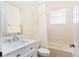 Bright bathroom with a tub/shower, white vanity, and a framed mirror at 4174 70Th Street E Cir, Palmetto, FL 34221