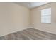 Bright bedroom with wood floors and ample natural light, creating a serene and inviting space at 4174 70Th Street E Cir, Palmetto, FL 34221