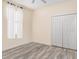 Cozy bedroom with a closet, carpeted floors, and natural light at 4174 70Th Street E Cir, Palmetto, FL 34221