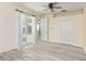 Spacious bedroom with neutral paint, hard surface floors, and a private entry to the back patio at 4174 70Th Street E Cir, Palmetto, FL 34221
