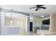Open-concept living space with modern finishes, seamlessly connecting the kitchen and living area for easy living at 4174 70Th Street E Cir, Palmetto, FL 34221