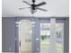 Bright living space with an open doorway to another room, showcasing modern interior design with elegant trim at 4174 70Th Street E Cir, Palmetto, FL 34221